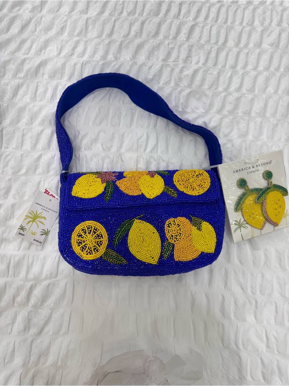 Blue Beaded Lemon Shoulder Bag with Earrings .